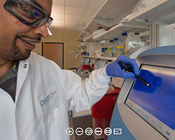 Scientist uses a special instrument to count bacteria cells.