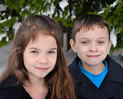 A pair of twins who look alike but are a boy and a girl.